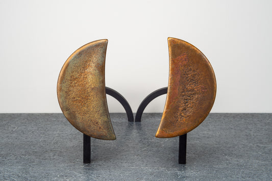 Borough Furnace Moon Andirons: sculptural crescent bronze finials on blackened steel firedog frame